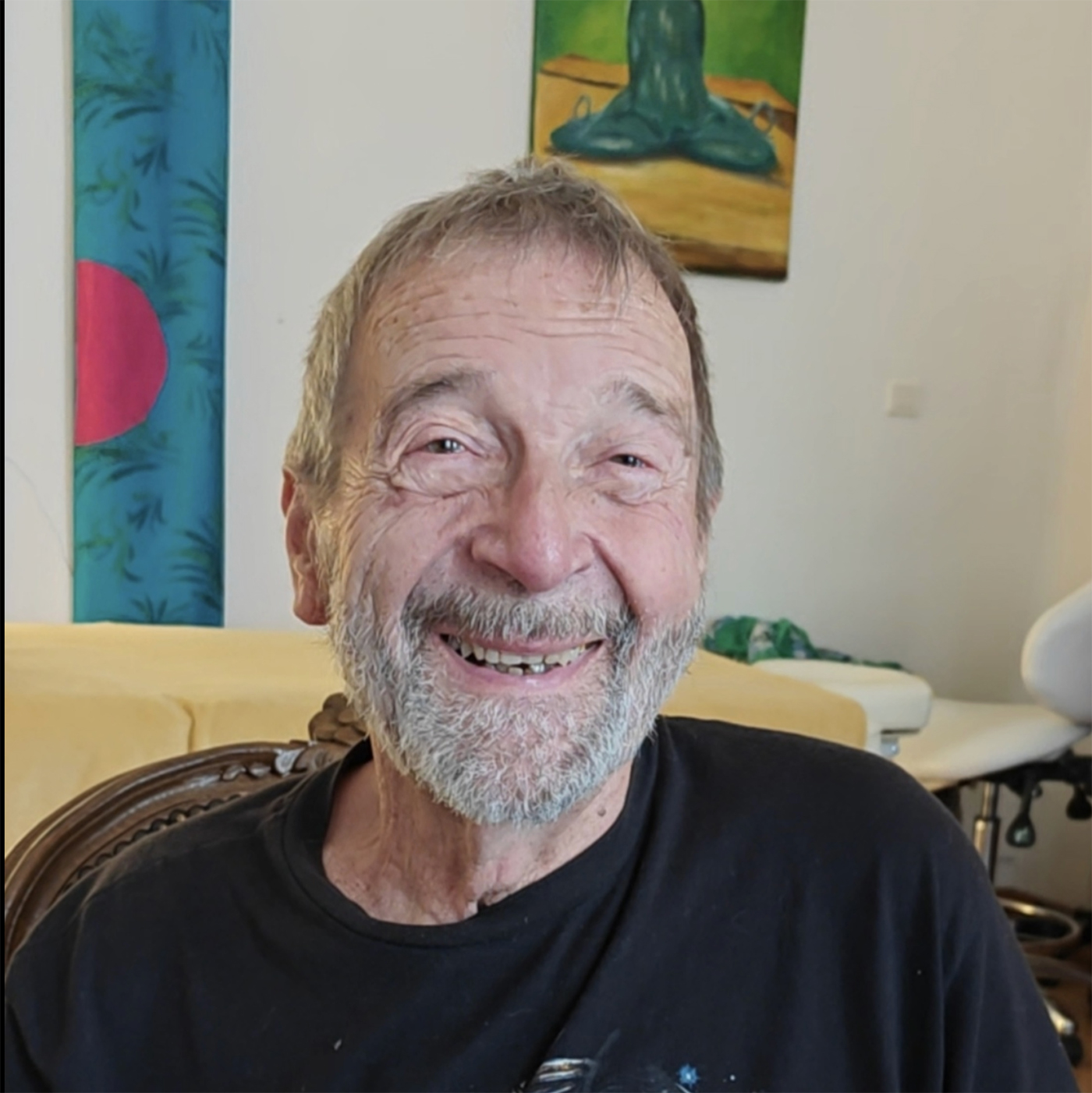 Smiling elderly man after Fasciapuncture session showing renewed joy and comfort